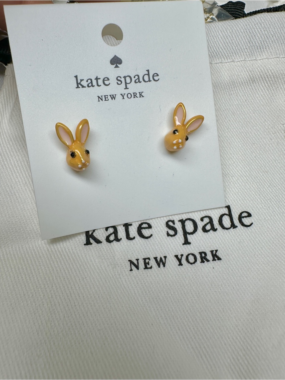kate spade Kangaroo Head Stud Earrings with Pearl Accent on the Back.